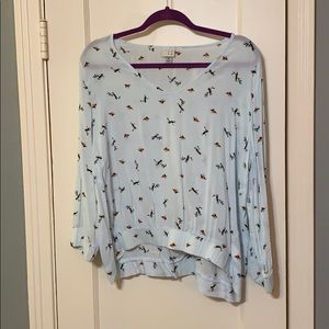 Light blue top with birds.